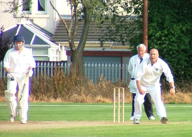 NG Campbell trying to scare the batsman with Umpire deep in concentration