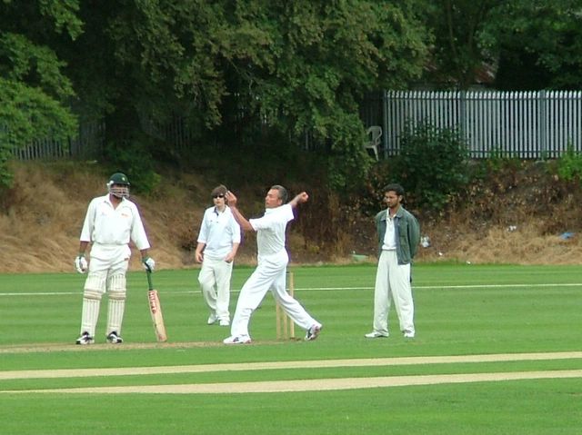 Gary Page opens the bowling from the \"Munro Road\" end