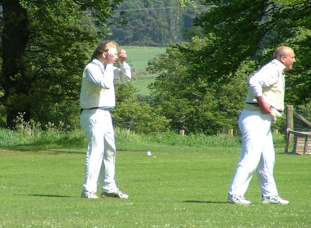 The young and the old. The long flowing locks and the bald. The fixing his hair and the getting ready to catch. Austin and Nige.