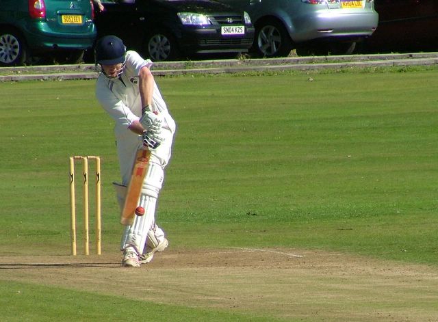 Poor man's sponsored stumps compared to black and orange stumps on show at Accies